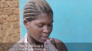 Young Ugandan woman eyes closed practicing Transcendental Meditation